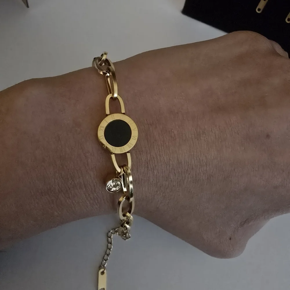 SS Elegant Gold and Black Bracelet